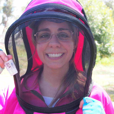 Clarisa in her pink bee suit!